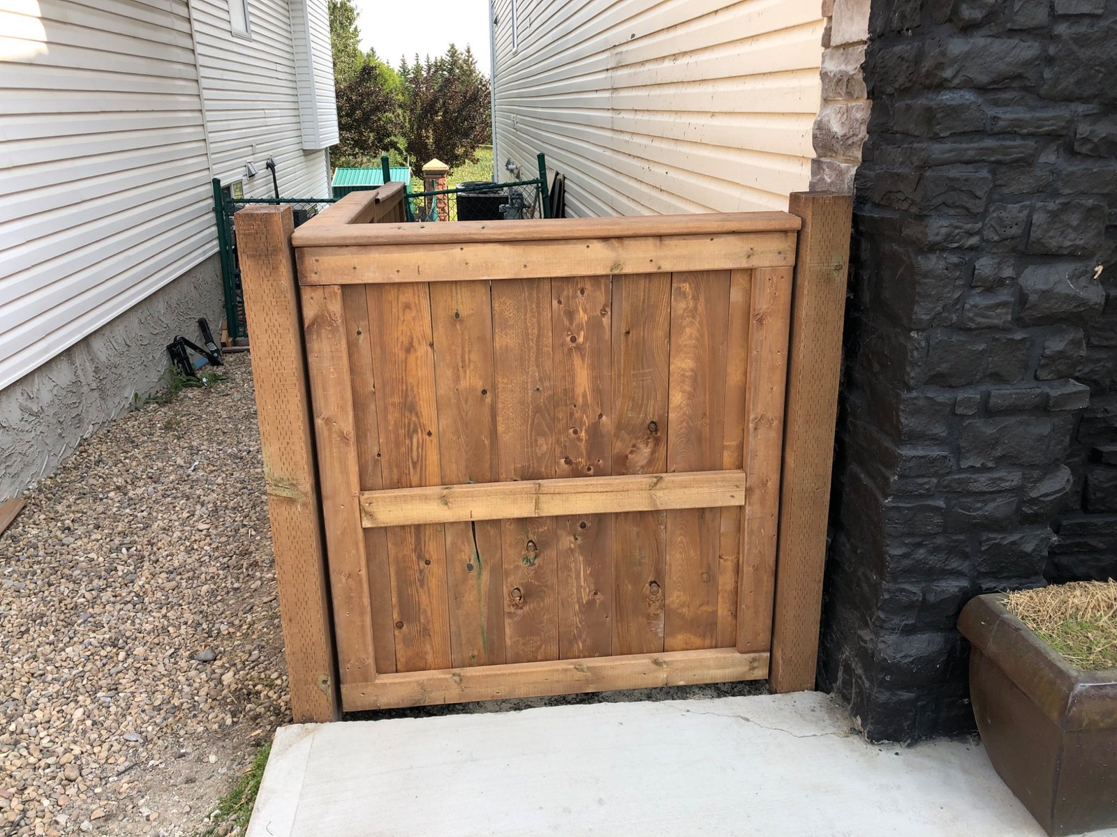 Front view of four-foot treated wood gate